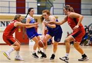 7 January 2022; Claire Melia of The Address UCC Glanmire in action against Simone O'Shea, left, and Shannon Ryan of Singleton Supervalu Brunell during the InsureMyHouse.ie Paudie O’Connor Cup semi-final match between The Address UCC Glanmire and Singleton's SuperValu Brunell at Neptune Stadium in Cork. Photo by Sam Barnes/Sportsfile