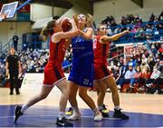 7 January 2022; Amy Dooley of The Address UCC Glanmire in action against Edel Thornton, left, and Simone O'Shea of Singleton Supervalu Brunell during the InsureMyHouse.ie Paudie O’Connor Cup semi-final match between The Address UCC Glanmire and Singleton's SuperValu Brunell at Neptune Stadium in Cork. Photo by Sam Barnes/Sportsfile