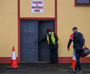 8 January 2022; Michael Leahy, from Ennis, Clare, opens the door for arriving Cork players before the McGrath Cup group A match between Clare and Cork at Hennessy Memorial Park in Miltown Malbay, Clare. Photo by Stephen McCarthy/Sportsfile