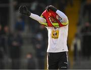 8 January 2022; Westmeath goalkeeper Jason Daly puts on a bib, due to a clash of colours with the Kildare jersey, before the start of the O'Byrne Cup Group C match between Kildare and Westmeath at St Conleth's Park in Newbridge, Kildare. Photo by Piaras Ó Mídheach/Sportsfile