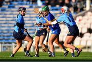 8 January 2022; Grainne Dolan of St Rynagh's gets a pass away under pressure from Gailltír players, from left, Anne Corcoran, Alannah O'Sullivan and Roisin Flood during the 2020 AIB All-Ireland Intermediate Club Camogie Championship Final match between Gailltír and St Rynagh's at Semple Stadium in Thurles, Tipperary. Photo by Ben McShane/Sportsfile