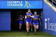 8 January 2022; St Rynagh's captain Grainne Dolan leads her side out before the 2020 AIB All-Ireland Intermediate Club Camogie Championship Final match between Gailltír and St Rynagh's at Semple Stadium in Thurles, Tipperary. Photo by Ben McShane/Sportsfile