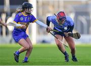 8 January 2022; Sinead Hanamy of St Rynagh's blocks the catch of Hannah Flynn of Gailltír during the 2020 AIB All-Ireland Intermediate Club Camogie Championship Final match between Gailltír and St Rynagh's at Semple Stadium in Thurles, Tipperary. Photo by Ben McShane/Sportsfile