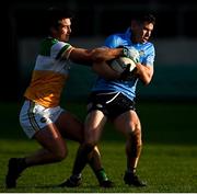 8 January 2022; Lee Gannon of Dublin in action against Cathal Mangan of Offaly during the O'Byrne Cup group A match between Offaly and Dublin at Bord na Mona O'Connor Park in Tullamore, Offaly. Photo by Harry Murphy/Sportsfile