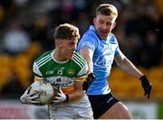 8 January 2022; Jack Bryant of Offaly in action against Sean Bugler of Dublin during the O'Byrne Cup group A match between Offaly and Dublin at Bord na Mona O'Connor Park in Tullamore, Offaly. Photo by Harry Murphy/Sportsfile
