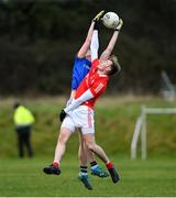 8 January 2022; Leonard Gray of Louth in action against Tadhg McNevin of Longford during the O'Byrne Cup group A match between Longford and Louth at Rathcline GAA club in Lanesboro, Longford. Photo by Ramsey Cardy/Sportsfile