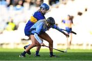 8 January 2022; Meave Sheridan of Gailltír in action against Mairead Daly of St Rynagh's during the 2020 AIB All-Ireland Intermediate Club Camogie Championship Final match between Gailltír and St Rynagh's at Semple Stadium in Thurles, Tipperary. Photo by Ben McShane/Sportsfile