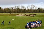 8 January 2022; The Longford team stand for a team photograph by taken by Syl Healy for the Longford Leader and freelance photographer Gerry Rowley before the O'Byrne Cup group A match between Longford and Louth at Rathcline GAA club in Lanesboro, Longford. Photo by Ramsey Cardy/Sportsfile