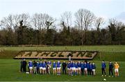 8 January 2022; The Longford team during the playing of the National Anthem prior to the O'Byrne Cup group A match between Longford and Louth at Rathcline GAA club in Lanesboro, Longford. Photo by Ramsey Cardy/Sportsfile