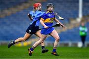 8 January 2022; Louise Mannion of St Rynagh's in action against Emily Mahony of Gailltír during the 2020 AIB All-Ireland Intermediate Club Camogie Championship Final match between Gailltír and St Rynagh's at Semple Stadium in Thurles, Tipperary. Photo by Ben McShane/Sportsfile