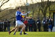 8 January 2022; Evan O’Carroll of Laois in action against Eoin Porter of Wexford during the O'Byrne Cup group B match between Wexford and Laois at Hollymount in Galbally, Wexford. Photo by Seb Daly/Sportsfile