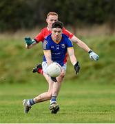 8 January 2022; Dylan Farrell of Longford in action against Donal McKenny of Louth during the O'Byrne Cup group A match between Longford and Louth at Rathcline GAA club in Lanesboro, Longford. Photo by Ramsey Cardy/Sportsfile