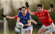 8 January 2022; Eoghán McCormack of Longford in action against Jack Murphy of Louth during the O'Byrne Cup group A match between Longford and Louth at Rathcline GAA club in Lanesboro, Longford. Photo by Ramsey Cardy/Sportsfile