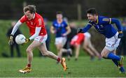 8 January 2022; Gerard Browne of Louth and Michael Quinn of Longford during the O'Byrne Cup group A match between Longford and Louth at Rathcline GAA club in Lanesboro, Longford. Photo by Ramsey Cardy/Sportsfile