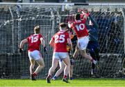 8 January 2022; Daniel O’Connell of Cork scores his side's first goal past Clare goalkeeper Stephen Ryan during the McGrath Cup group A match between Clare and Cork at Hennessy Memorial Park in Miltown Malbay, Clare. Photo by Stephen McCarthy/Sportsfile