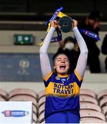 8 January 2022; St Rynagh's captain Grainne Dolan lifts the cup after the 2020 AIB All-Ireland Intermediate Club Camogie Championship Final match between Gailltír and St Rynagh's at Semple Stadium in Thurles, Tipperary. Photo by Ben McShane/Sportsfile