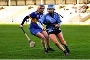 8 January 2022; Aoife Hartley of Gailltír in action against Roisin Daly of St Rynagh's during the 2020 AIB All-Ireland Intermediate Club Camogie Championship Final match between Gailltír and St Rynagh's at Semple Stadium in Thurles, Tipperary. Photo by Ben McShane/Sportsfile