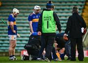 8 January 2022; Willie Connors of Tipperary receives medical treatment after sustaining an injury during the Co-Op Superstores Munster Hurling Cup quarter-final match between Kerry and Tipperary at Austin Stack Park, in Tralee, Kerry. Photo by Eóin Noonan/Sportsfile