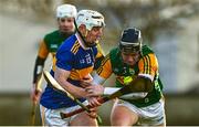 8 January 2022; Sean Ryan of Tipperary in action against Michael Leane of Kerry during the Co-Op Superstores Munster Hurling Cup quarter-final match between Kerry and Tipperary at Austin Stack Park, in Tralee, Kerry. Photo by Eóin Noonan/Sportsfile