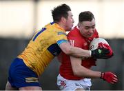 8 January 2022; Sean Meehan of Cork in action against Keelan Sexton of Clare during the McGrath Cup group A match between Clare and Cork at Hennessy Memorial Park in Miltown Malbay, Clare. Photo by Stephen McCarthy/Sportsfile