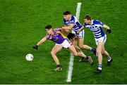 8 January 2022; Conor Casey of Kilmacud Crokes in action against Jack Cleary, left, and James Burke of Naas during the AIB Leinster GAA Football Senior Club Championship Final match between Kilmacud Crokes and Naas at Croke Park in Dublin. Photo by Daire Brennan/Sportsfile