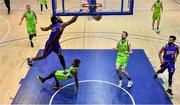 8 January 2022; Devin Gilmore of DBS Eanna dunks the ball over Aaron Calixte of Garvey's Tralee Warriors during the InsureMyHouse.ie Pat Duffy National Cup semi-final match between DBS Éanna and Garvey’s Warriors Tralee at Neptune Stadium in Cork. Photo by Brendan Moran/Sportsfile