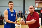 8 January 2022; Basketball Ireland President PJ Reidy, right, presents Tobias Christensen of UCC Demons with the Player of the Month Award for December before the President's Cup semi-final match between UCC Demons and EJ Sligo All-Stars at Parochial Hall in Cork. Photo by Sam Barnes/Sportsfile