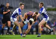 8 January 2022; Shane Cunningham of Kilmacud Crokes in action against Seán Cullen, left, and James Burke of Naas during the AIB Leinster GAA Football Senior Club Championship Final match between Kilmacud Crokes and Naas at Croke Park in Dublin. Photo by Daire Brennan/Sportsfile