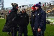 8 January 2022; Offaly manager John Maughan, right, speaks to his selectors, from left, Gerry O'Malley, Kevin Guing and Tomás Ó Sé after the O'Byrne Cup group A match between Offaly and Dublin at Bord na Mona O'Connor Park in Tullamore, Offaly. Photo by Harry Murphy/Sportsfile