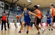 8 January 2022; Tobias Christensen of UCC Demons in action against Keith Jordan Jr of EJ Sligo All-Stars during the President's Cup semi-final match between UCC Demons and EJ Sligo All-Stars at Parochial Hall in Cork. Photo by Sam Barnes/Sportsfile