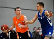8 January 2022; Oisin O'Reilly of EJ Sligo All-Stars in action against Tobias Christensen of UCC Demons during the President's Cup semi-final match between UCC Demons and EJ Sligo All-Stars at Parochial Hall in Cork. Photo by Sam Barnes/Sportsfile