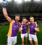 8 January 2022; Kilmacud Crokes players, from left, Shane Horan, Tom Fox and Shane Cunningham celebrate after the AIB Leinster GAA Football Senior Club Championship Final match between Kilmacud Crokes and Naas at Croke Park in Dublin. Photo by David Fitzgerald/Sportsfile