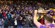 8 January 2022; Kilmacud Crokes supporters celebrate in the Hogan Stand after the AIB Leinster GAA Football Senior Club Championship Final match between Kilmacud Crokes and Naas at Croke Park in Dublin. Photo by Daire Brennan/Sportsfile