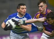 8 January 2022; Eamonn Callaghan of Naas is tackled by Dara Mullin, right, and Dan O’Brien of Kilmacud Crokes the AIB Leinster GAA Football Senior Club Championship Final match between Kilmacud Crokes and Naas at Croke Park in Dublin. Photo by David Fitzgerald/Sportsfile