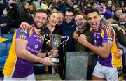 8 January 2022; Shane Horan celebrates with his family, left to right, sister Lucy, dad Aidan, brother Ciarán, and brother Barry, with Craig Dias after the AIB Leinster GAA Football Senior Club Championship Final match between Kilmacud Crokes and Naas at Croke Park in Dublin. Photo by Daire Brennan/Sportsfile