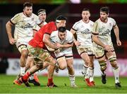 8 January 2022; James Hume of Ulster is tackled by Thomas Ahern of Munster during the United Rugby Championship match between Munster and Ulster at Thomond Park in Limerick. Photo by Stephen McCarthy/Sportsfile