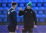 7 January 2022; Ireland backs and skills coach Mark Sexton speaks with Ben Brownlee of Ireland during a development match between Leinster A and Ireland U20 at Energia Park in Dublin. Photo by Harry Murphy/Sportsfile