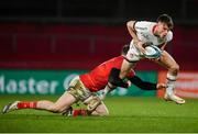 8 January 2022; Ethan McIlroy of Ulster is tackled by Stephen Archer of Munster during the United Rugby Championship match between Munster and Ulster at Thomond Park in Limerick. Photo by Stephen McCarthy/Sportsfile