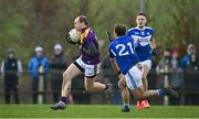 8 January 2022; Kevin O’Grady of Wexford in action against Gareth Dillon of Laois during the O'Byrne Cup group B match between Wexford and Laois at Hollymount in Galbally, Wexford. Photo by Seb Daly/Sportsfile
