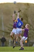 8 January 2022; Liam Coleman of Wexford in action against Brian Daly of Laois during the O'Byrne Cup group B match between Wexford and Laois at Hollymount in Galbally, Wexford. Photo by Seb Daly/Sportsfile