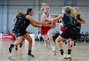 9 January 2022; Lauryn Homan of Singleton SuperValu Brunell in action against Shauna Dooley, left, and Ciara Byrne of Portlaoise Panthers during the Basketball Ireland Women's U20 semi-final match between Singleton Supervalu Brunell and Portlaoise Panthers at Parochial Hall in Cork. Photo by Sam Barnes/Sportsfile