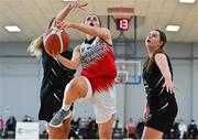 9 January 2022; Emily Peyton Blake of Singleton SuperValu Brunell in action against Gillian Wheeler, left, and Sarah Flemming of Portlaoise Panthers during the Basketball Ireland Women's U20 semi-final match between Singleton Supervalu Brunell and Portlaoise Panthers at Parochial Hall in Cork. Photo by Sam Barnes/Sportsfile