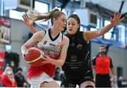 9 January 2022; Lauryn Homan of Singleton SuperValu Brunell in action against Jasmine Burke of Portlaoise Panthers during the Basketball Ireland Women's U20 semi-final match between Singleton Supervalu Brunell and Portlaoise Panthers at Parochial Hall in Cork. Photo by Sam Barnes/Sportsfile