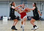 9 January 2022; Emily Peyton Blake of Singleton SuperValu Brunell in action against Gillian Wheeler, left, and Sarah Flemming of Portlaoise Panthers during the Basketball Ireland Women's U20 semi-final match between Singleton Supervalu Brunell and Portlaoise Panthers at Parochial Hall in Cork. Photo by Sam Barnes/Sportsfile