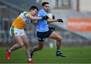 8 January 2022; Niall Scully of Dublin in action against Kieran Dolan of Offaly during the O'Byrne Cup group A match between Offaly and Dublin at Bord na Mona O'Connor Park in Tullamore, Offaly. Photo by Harry Murphy/Sportsfile