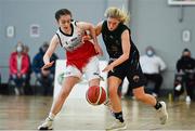 9 January 2022; Ciara Byrne of Portlaoise Panthers in action against Issy McSweeney of Singleton SuperValu Brunell during the Basketball Ireland Women's U20 semi-final match between Singleton Supervalu Brunell and Portlaoise Panthers at Parochial Hall in Cork. Photo by Sam Barnes/Sportsfile