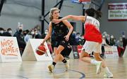 9 January 2022; Ciara Byrne of Portlaoise Panthers in action against Mia Finnegan of Singleton SuperValu Brunell during the Basketball Ireland Women's U20 semi-final match between Singleton Supervalu Brunell and Portlaoise Panthers at Parochial Hall in Cork. Photo by Sam Barnes/Sportsfile