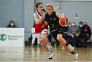 9 January 2022; Ciara Byrne of Portlaoise Panthers in action against Issy McSweeney of Singleton SuperValu Brunell during the Basketball Ireland Women's U20 semi-final match between Singleton Supervalu Brunell and Portlaoise Panthers at Parochial Hall in Cork. Photo by Sam Barnes/Sportsfile