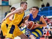 9 January 2022; Conor Walsh of UCD Marian in action against Rory O'Connor of Killorglin CYMS during the Basketball Ireland Men's U20 Cup semi-final match between UCD Marian and Killorglin CYMS at Neptune Stadium in Cork. Photo by Brendan Moran/Sportsfile