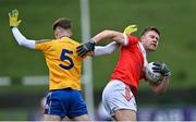 9 January 2022; Niall Daly of Pádraig Pearses in action against Nathan Armstrong of Knockmore during the AIB Connacht GAA Football Senior Club Championship Final match between Knockmore and Pádraig Pearses at James Stephens Park in Ballina, Mayo. Photo by Piaras Ó Mídheach/Sportsfile